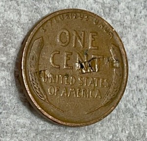 1929 wheat penny lamination error showing planchet surface peeling or flaking from impurity in copper alloy